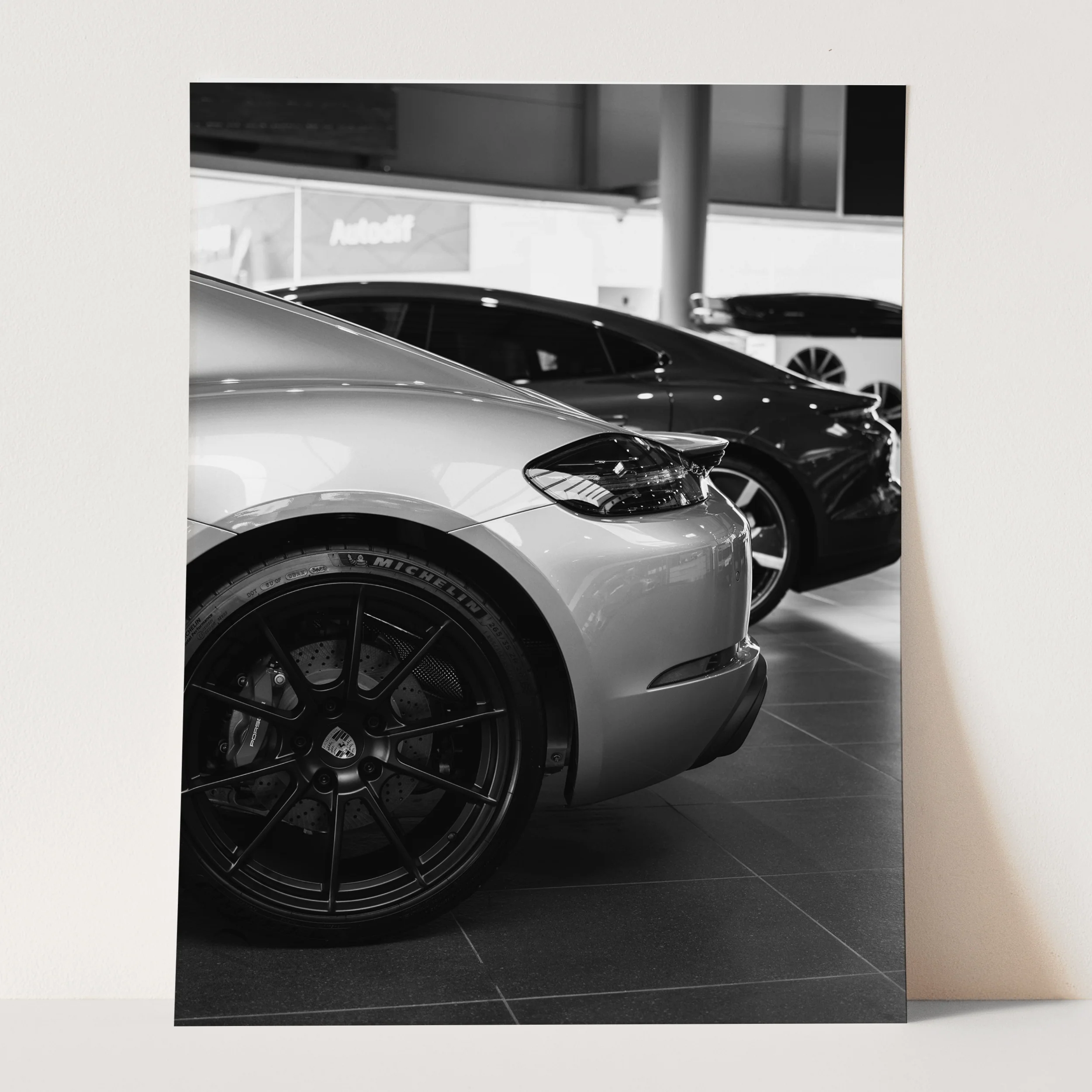 Black & White Porsche in the Showroom - Image 3