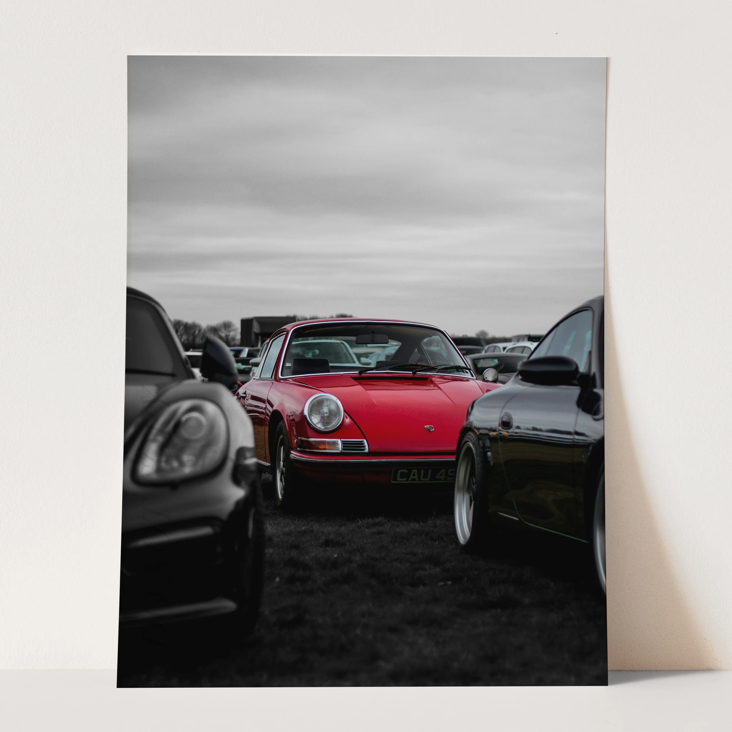 Red Porsche in a Field of Black & White - Image 3