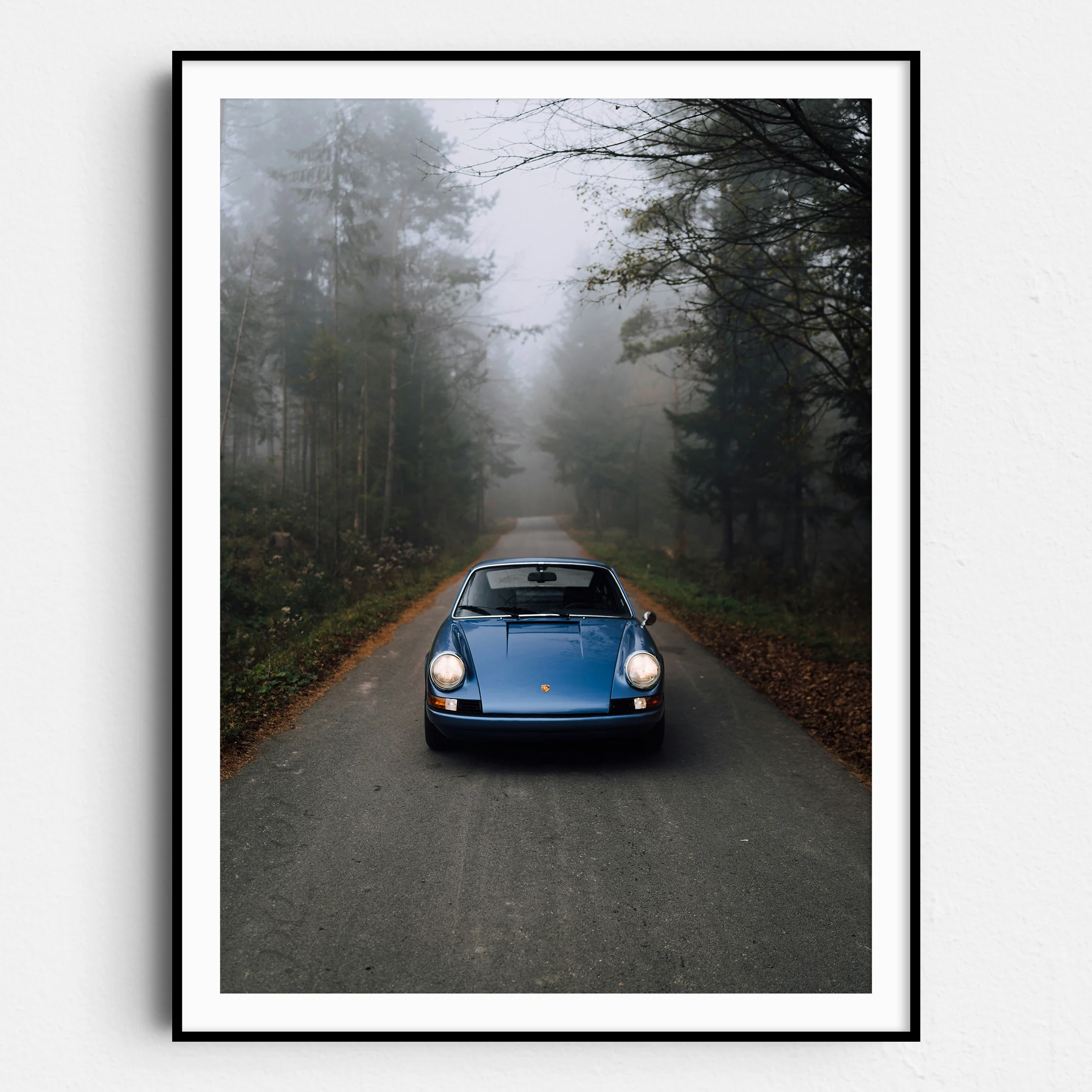 Vintage Blue Porsche in the Mist