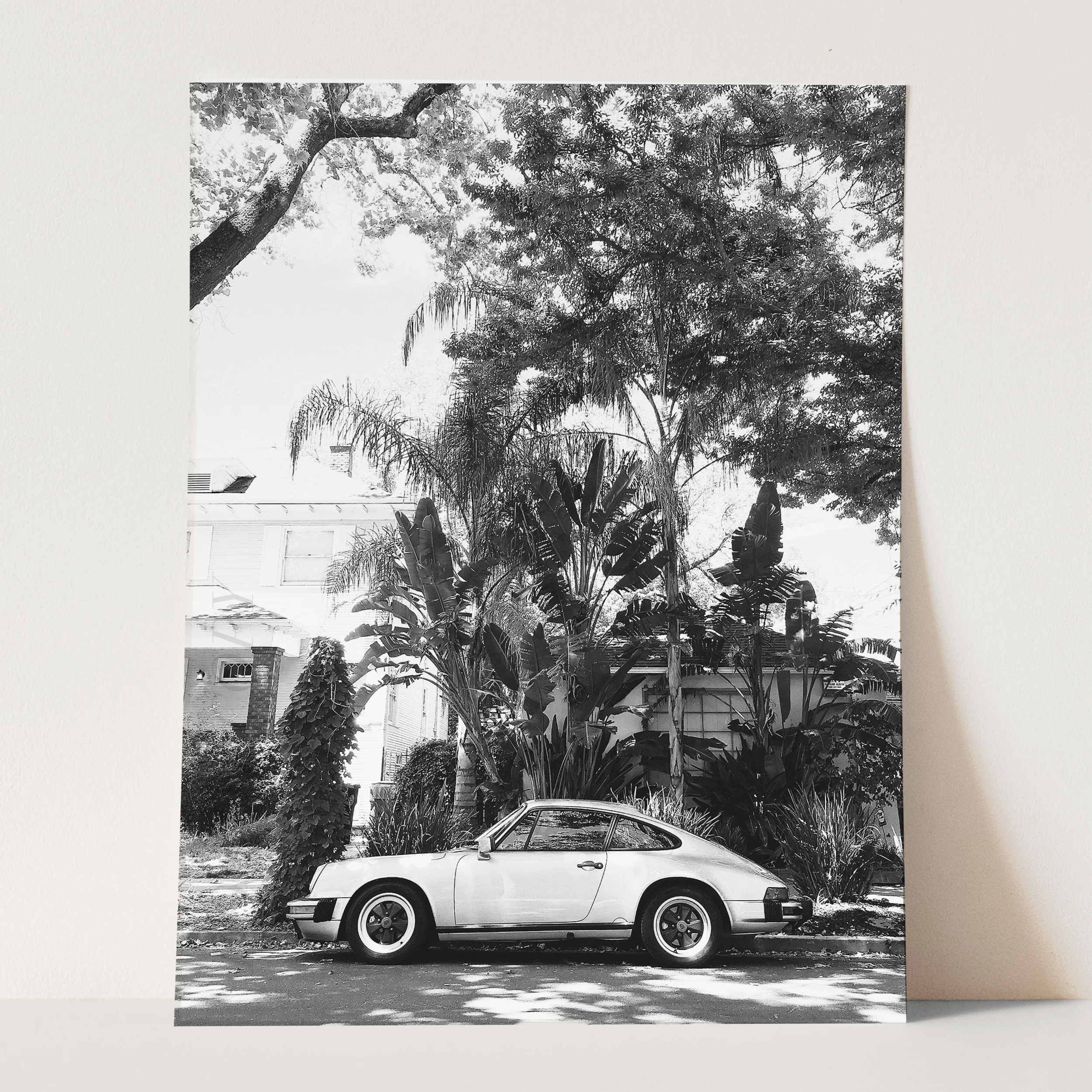 Vintage Porsche 911 Under Palm Trees in Black & White - Image 3