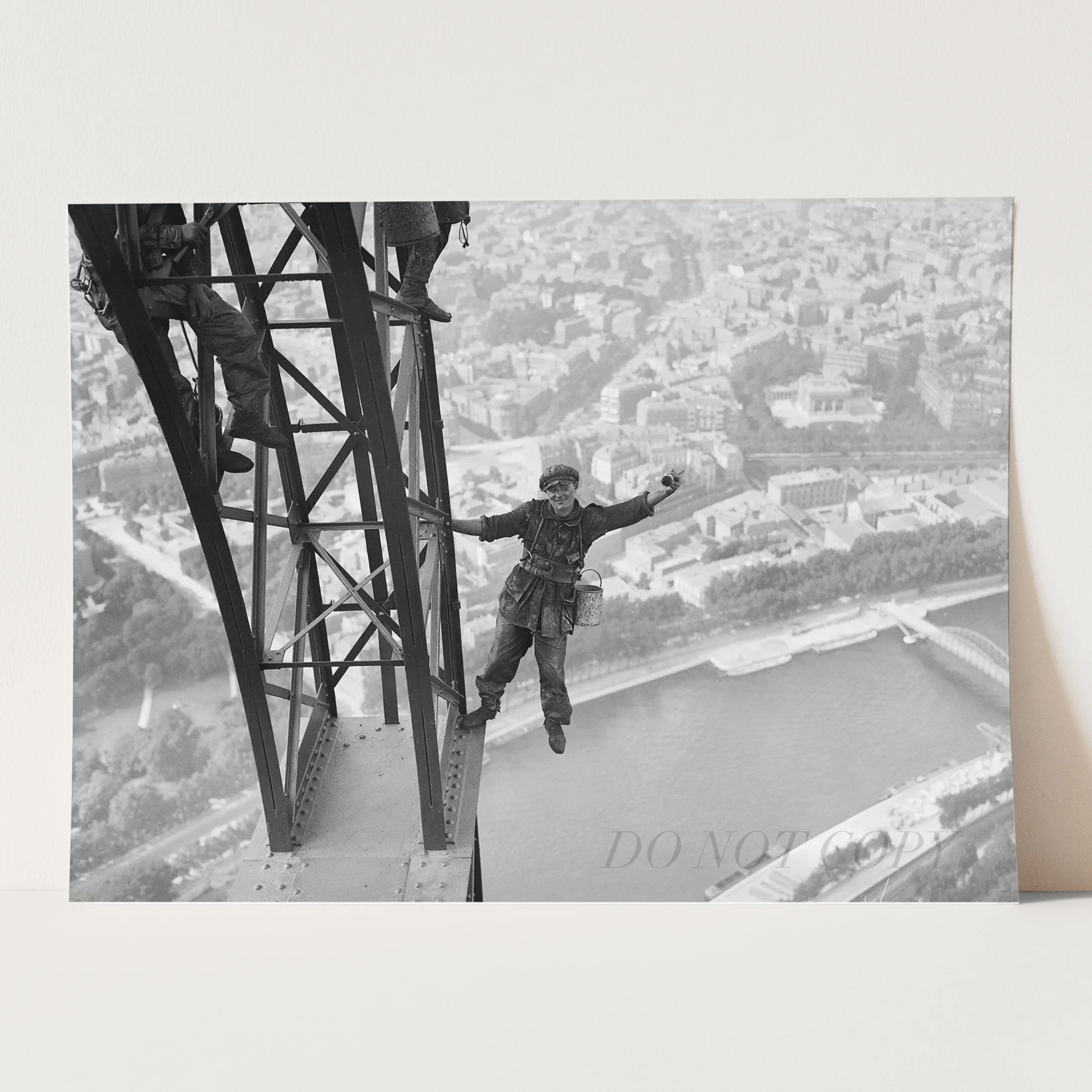 Worker Finishes Painting the Eiffel Tower - Image 3